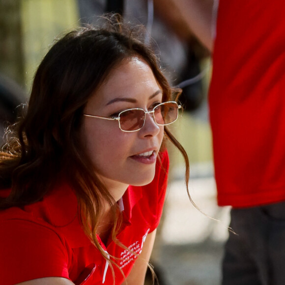 Exclusif - Dounia Coesens - Pétanque du coeur dans le cadre le la 20ème édition de "l'étape du coeur" de l'association "Mécénat Chirurgie Cardiaque" (MCC) lors du tour de France 2023 au Fan Club de Bordeaux, France, le 06 juillet 2023. © Christophe Clovis / Bestimage 