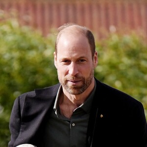 "Rentrez chez vous, vous n'êtes pas le bienvenu" ou encore "Vous n'avez aucune souveraineté dans ce pays" pouvait-on lire sur des pancartes
Le prince William, prince de Galles, participe à un entraînement de rugby avec des écoliers lors d'une visite à l'école secondaire Ocean View au Cap, en Afrique du Sud le 4 novembre 2024. © Alpha Press / Bestimage 