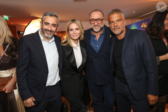 Exclusif - Eric Toledano, Frank Tapiro avec sa femme Charlotte Rosier et Steve Suissa - Soirée du 6ème Gala caritatif de l'Institut Rafaël et de la Zag Foundation, dédié à l'accompagnement des enfants en santé intégrative au Pavillon Gabriel à Paris le 12 novembre 2024. © Erez Lichtfeld/Bestimage 