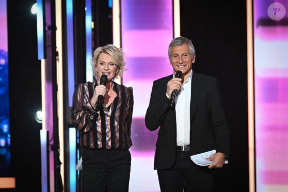 Sophie Davant, journaliste et animatrice radio et télévision et Nagui, animateur radio et télévision lors du Téléthon 2023, à Saint Denis, près de Paris, France le 8 décembre 2023.