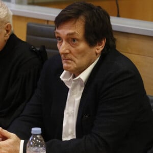 Pierre Palmade au tribunal de Melun avec ses avocats Me Alain Barsikian et Me Céline Lasek pour son procès pour blessures involontaires à la suite d'un accident de la route en février 2023 dans lequel sa voiture a percuté un autre véhicule à Melun. Le 20 novembre 2024. © Christophe Clovis / Bestimage 