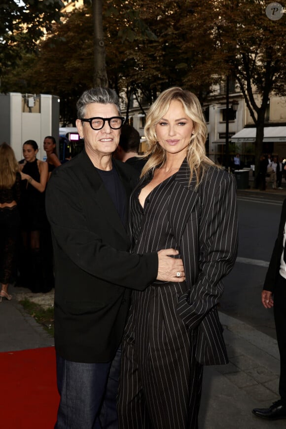 
Marc Lavoine et sa compagne Adriana Karembeu arrivant au "Concerto pour la Paix" organisé par Omar Harfouch au Théâtre des Champs Élysées à Paris, France, le 18 Septembre 2024. © Perusseau / Tribeca / Bestimage