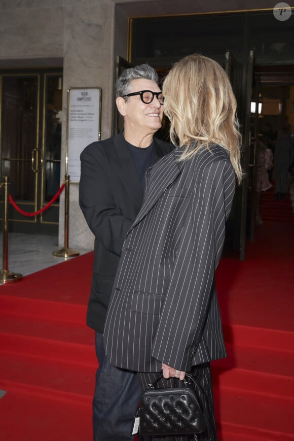 Marc Lavoine et sa compagne Adriana Karembeu arrivant au "Concerto pour la Paix" organisé par Omar Harfouch au Théâtre des Champs Élysées à Paris, France, le 18 Septembre 2024. © Perusseau / Tribeca / Bestimage 