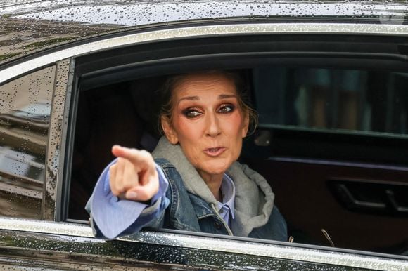 Un complexe de luxe où elle peut jouir à foison de la nature sauvage de la région, du calme, de la tranquillité et bien sûr des sports d'hiver. 
Paris, FRANCE - Celine Dion takes pictures and waves to fans as she prepares to perform for the Olympic Games in Paris, creating joyful memories with her admirers. Pictured: Céline Dion