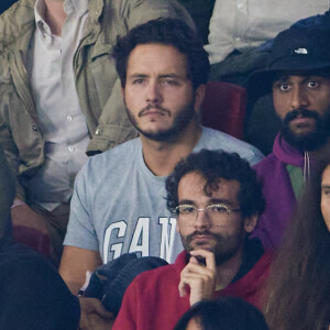 En effet, Alexandre Kominek a donné une représentation spéciale de son spectacle dans sa ville natale de Genève le mercredi 20 novembre 2024
Alexandre Kominek (compagnon de Florence Foresti) - People dans les tribunes du match de Ligue des champions entre le PSG et le Borussia Dortmund (2-0) au Parc des Princes à Paris le 19 septembre 2023. © Cyril Moreau/Bestimage