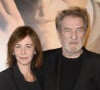 "J'ai beaucoup perdu de temps aux tables de jeux", indique Eddy Mitchell à Gala
 
Eddy Mitchell et sa femme Muriel - Avant-première du film "La French" au cinéma Gaumont Opéra à Paris, le 25 novembre 2014.