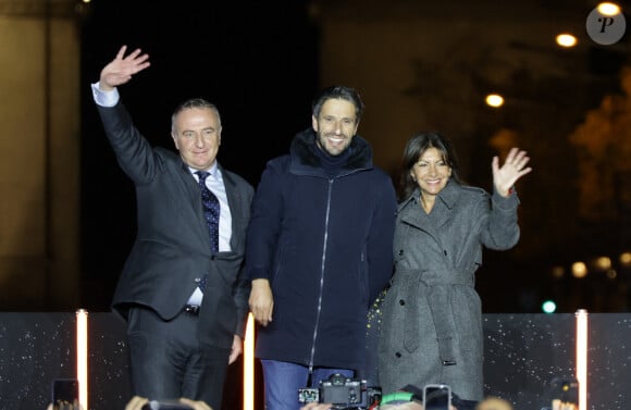 Marc-Antoine Jamet (président du comité des Champs- Elysées), Tony Estanguet et Anne Hidalgo - Lancement des Illuminations de Noël des Champs-Elysées à Paris le 24 novembre 2024. © Coadic Guirec/Bestimage  Launch of the Christmas Illuminations on the Champs-Elysées in Paris on November 24, 2024. 