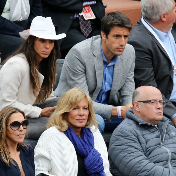 Christine Caron, Tony Estanguet et sa femme Laetitia - People dans les tribunes lors du tournoi de tennis de Roland Garros à Paris le 29 mai 2015.