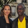 Karine Le Marchand et son compagnon Lilian Thuram lors du gala d'Amnesty International France, ''musique contre l'oubli'', au théâtre des Champs-Elysées à Paris le 16 avril 2010