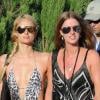 Paris Hilton, accompagnée de sa soeur, Nicky Hilton, arrivent au Nikki Beach le samedi 24 juillet à Saint-Tropez.