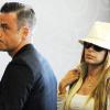 
Robbie Williams et sa compagne Ayda Fields arrivent à l'aéroport de Los Angeles en mai 2010