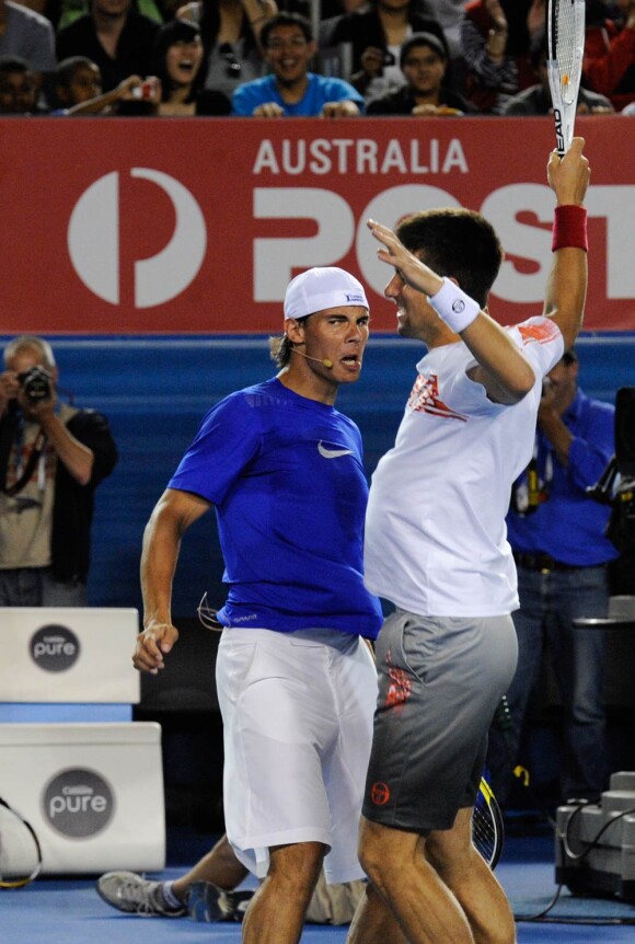 Rafael Nadal et Novak Djokovic dans l'histoire du tennis : 36 ans après Connors/Ashe, les numéros un et deux mondiaux joueront en double en compétition, à Toronto, mi-août 2010. Photo : match caritatif pour Haïti, janvier 2010.