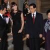Carla Bruni et Nicolas Sarkozy avec leurs homologues chinois Hu Jintao et Liu Yongqing lors du dîner d'Etat à L'Elysée le 4/11/10