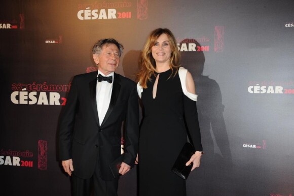 Roman Polanski et Emmanuelle Seigner lors de la cérémonie des César au théâtre du Châtelet à Paris, le 25 février 2011.