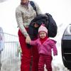 La famille royale norvégienne honore de sa présence les championnats de   ski du monde nordique, qui se déroulent jusqu'au 6 mars 2011 dans la région   d'Oslo. Photo : la princesse Martha-Louise et sa petite Emma.