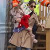 Katie Holmes et sa fille Suri Cruise à l'héliport de New York, le 11 mars 2011