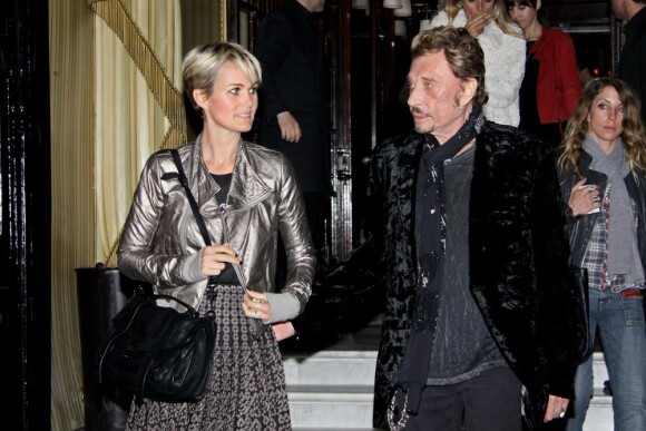 Johnny et Laeticia Hallyday à la sortie de l'hôtel Costes mardi 22 mars 2011