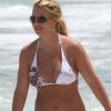 Britney Spears s'amuse dans les vagues. Tellement sexy en bikini ! 31 août 2009, Miami