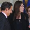 Carla Bruni-Sarkozy et son époux, sur le perron de l'Elysée pour la visite du président sud-coréen le 13 mai 2011