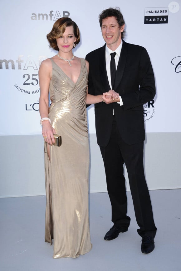 Milla Jovovich et son mari Paul W.S. Anderson lors du gala de l'amfAR au Cap d'Antibes le 19 mai 2011