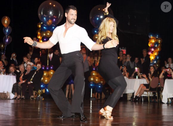 Kirstie Alley et son partenaire de danse dans Dancing with the Stars Maksim Chmerkovskiy, aux "Dance With Me" Studios de New York pour la soirée "All the right Moves !" le 5 juin 2011.