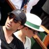 Gad Elmaleh et son fils Noé lors de la finale du tournoi de Roland-Garros, le 5 juin 2011.