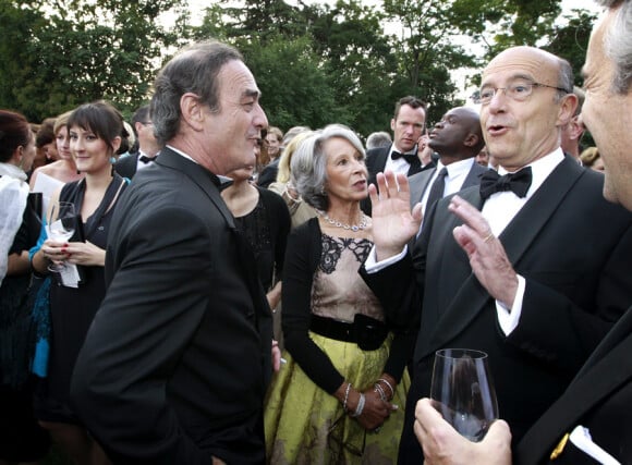 Jean-Louis Triaud et Alain Juppé lors de la Fête de la Rose qui achève le salon Vinexpo au château Lascombes à Margaux le 23 juin 2011