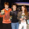 Daniel Radcliffe, Emma Watson et Rupert Grint en 2003 pour le lancement du DVD de Harry Potter et la Chambre des secrets 