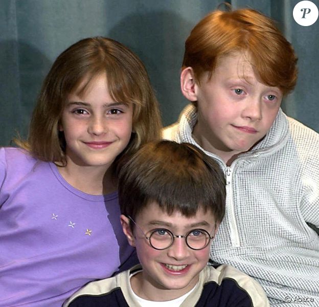 Daniel Radcliffe, Emma Watson et Rupert Grint en 2000 pour un photocall de Harry Potter à l'école des sorciers
