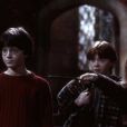 Emma Watson (Hermione), Rupert Grint (Ron) et Daniel Radcliffe (Harry) dans le film Harry Potter à l'école des sorciers - 2001 