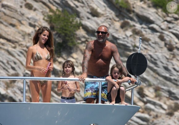 Christian Audigier, sa chérie Nathalie et ses fils en vacances à Ibiza le 30 juillet 2011