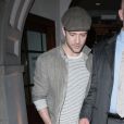 Justin Timberlake sortant du restaurant avec sa partenaire à l'écran (et plus?) Mila Kunis. Le 2 août 2011 à Londres 