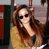 Après s'être rendue dans un salon de beauté à Los Angeles, Demi Lovato rejoint sa voiture, mardi 2 août 2011. 