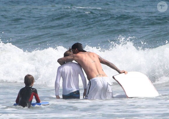 David Beckham et ses fils sur la plage de Malibu le 12 août 2011