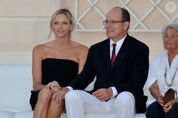 Charlene et Albert de Monaco, complices, à l'occasion du 100e anniversaire du Golf Club de Monte-Carlo, le 27 août 2011