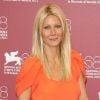 L'actrice Gwyneth Paltrow, rayonnante dans sa robe Prada, lors du photocall du film Contagion. Venise, le 3 septembre 2011.