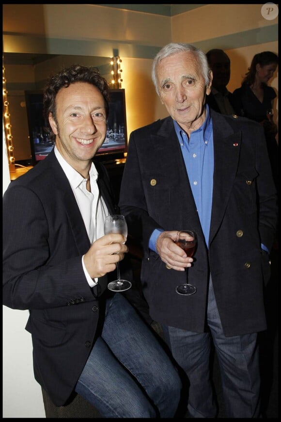 Charles Aznavour, mercredi 28 septembre 2011, était bien entouré pour la soirée spéciale au profit de l'association Aznavour pour l'Arménie, à l'Olympia. Plein d'amis sur scène, plein d'amis dans la salle...