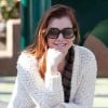 Alyson Hannigan, souriante lors d'une après midi en famille à Los Angeles, le 25 novembre 2011.