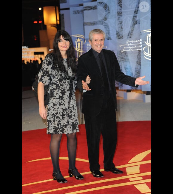 Claude Lelouch et sa bien-aimée Valérie lors de l'ouverture du festival de cinéma de Marrakech le 2 décembre 2011