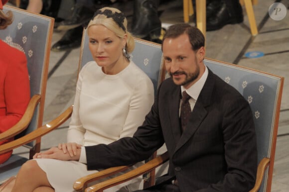 Le couple prince Mette-Marit et Haakon lors de la remise des prix Nobel de la Paix à Oslo en Norvège le 10 décembre 2011