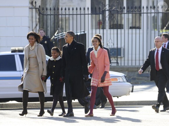 Le président Obama et les trois femmes de sa vie à Washington, le 11 décembre 2011.