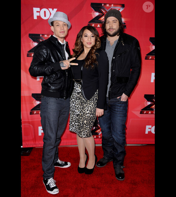 Les trois finalistes Chris Rene, Melanie Amaro et Josh Krajcik lors de la conférence de presse de X Factor dans les studios CBS à Los Angeles le 19 décembre 2011