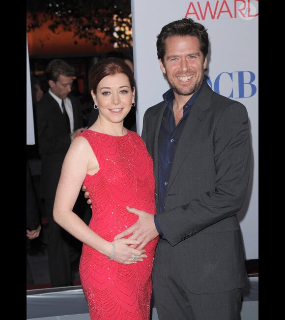 Alyson Hannigan, enceinte, et son mari lors des People's choice Awards, le 11 janvier 2012, à Los Angeles