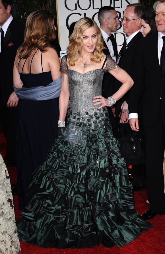 Vainqueur de l'award de la meilleure chanson originale, Madonna foulait le tapis rouge des Golden Globes 2012 dans une robe Reem Acra. Los Angeles, le 15 janvier 2012.