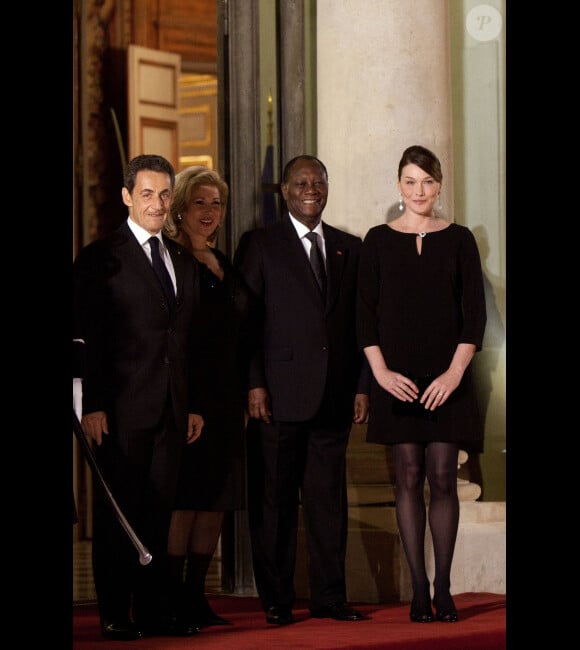 Nicolas Sarkozy, Dominique et Alassane Ouattara et Carla Bruni-Sarkozy lors du dîner d'Etat en l'honneur du président ivoirien Alassane Ouattara le 26 janvier 2012 à l'Elysée