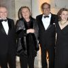Monsieur et madame François Pinault au côté du Professeur David Khayat lors de la soirée de gala au château de Versailles, au profit de l'association AVEC (Association pour la vie espoir contre le cancer), le 30 janvier 2012
