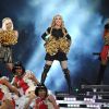 Madonna, impératrice antique, déesse moderne de la pop mais aussi cheerleader avec Nicki Minaj et M.I.A. sur Give Me All Your Luvin, a offert un show spectaculaire à la mi-temps du Super Bowl XLVI, le 5 février 2012 au Lucas Oil Stadium d'Indianapolis.