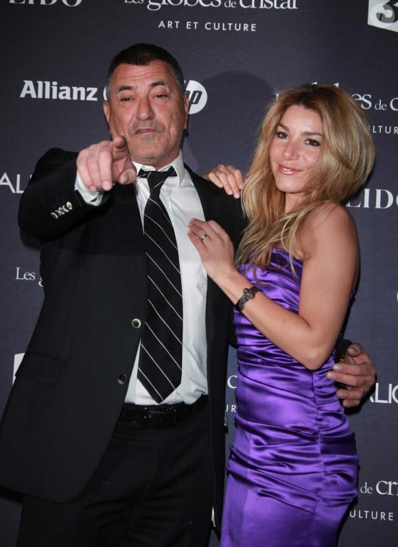 Jean-Marie Bigard et son épouse Lola à la cérémonie des Globes de Cristal, au Lido à Paris, le 6 février 2012.