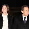 Carla Bruni et Nicolas Sarkozy arrivent dans les locaux de TF1 où le président annoncera sa candidature sur le plateau du JT, le 15 février 2012.