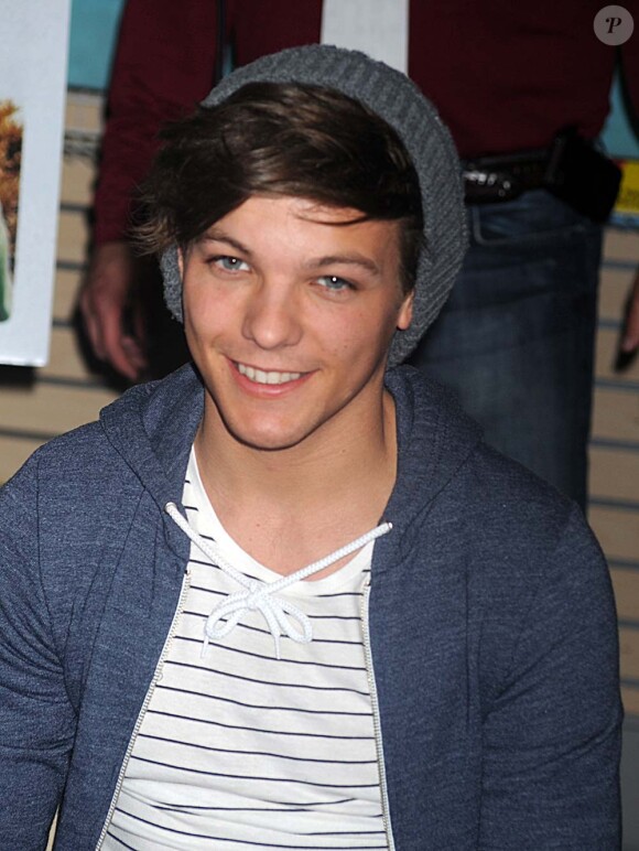 Louis Tomlinson de One Direction dans un magasin de disques new-yorkais, le 12 mars 2012.
